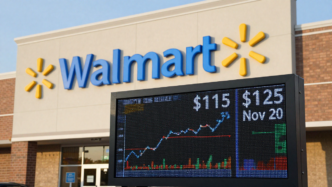 Walmart store exterior beside a market display showing $115 and $125 November option strikes.