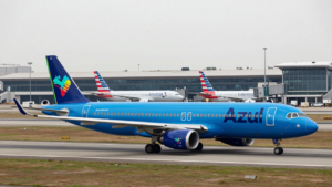 Azul and American Airlines aircraft at an airport, illustrating the approved investment.