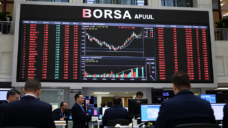 Electronic market screens at Borsa Istanbul showing falling share prices.