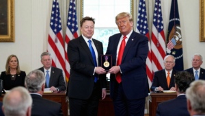 Donald Trump presents a science medal to Elon Musk at a White House ceremony.