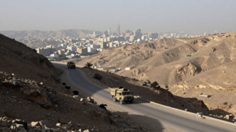 Military vehicles on a rugged road in Yemen’s northern highlands.