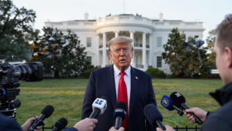 Donald Trump speaks to reporters outside the White House about a scheduled call with Vladimir Putin.