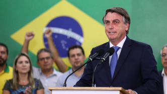 Flávio Bolsonaro speaks at a campaign event after Brazil’s first-round presidential election.