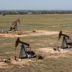 Pumpjacks operating across a South Texas oilfield in the Eagle Ford region