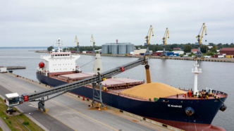 Bulk grain carrier and loading equipment at a Baltic seaport
