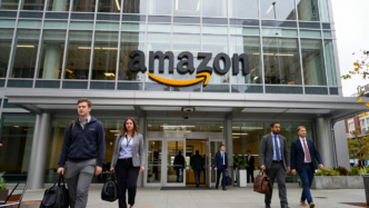 Employees outside an Amazon office building in Seattle.