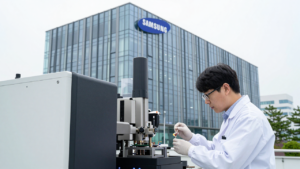 Samsung Electronics headquarters and a cleanroom technician holding a semiconductor wafer.