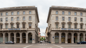 Bank facades in Milan representing Intesa Sanpaolo’s takeover offer for Monte dei Paschi di Siena.